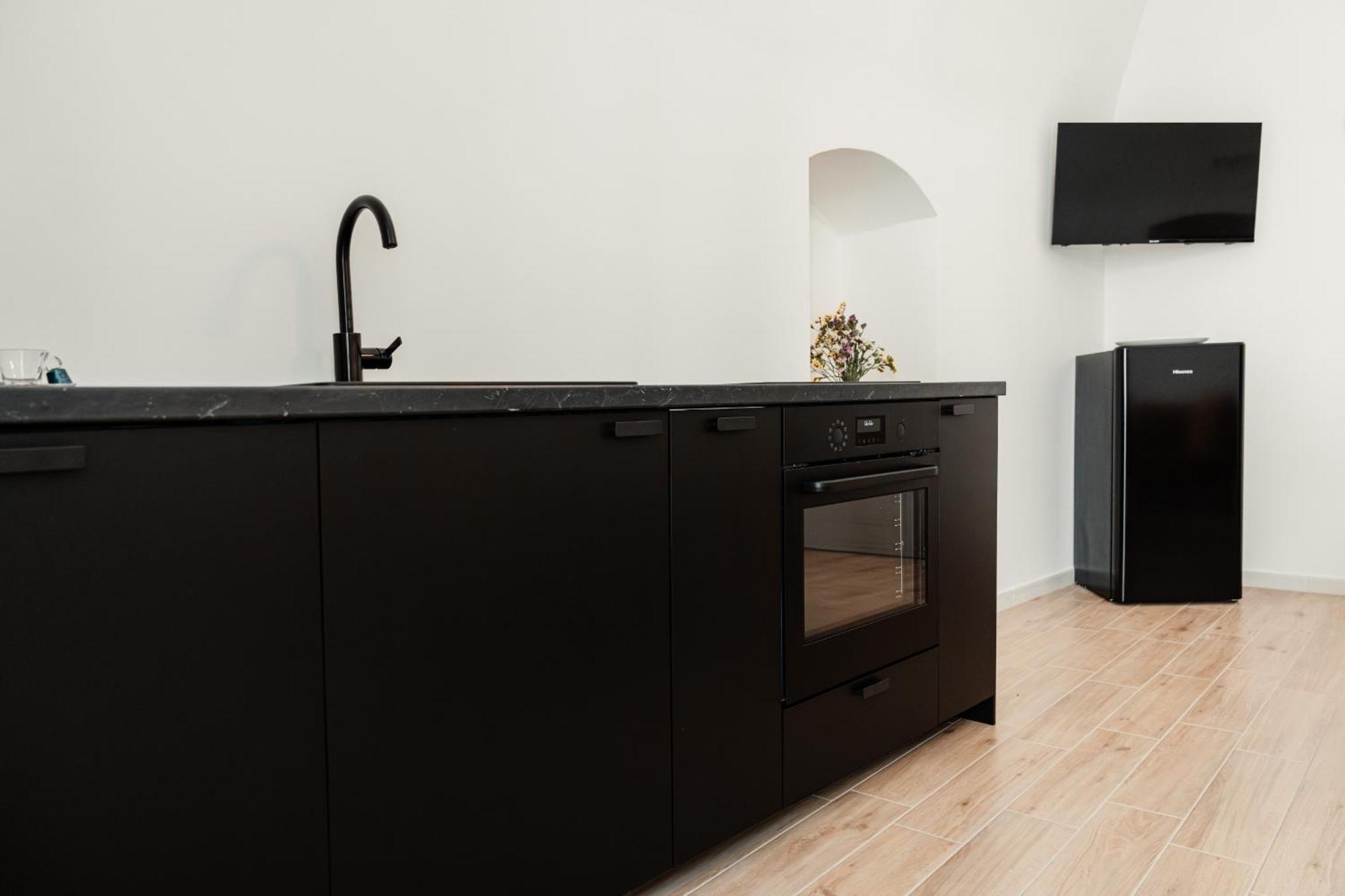 Aparthotel Camere Del Capitolo Бишелие Екстериор снимка